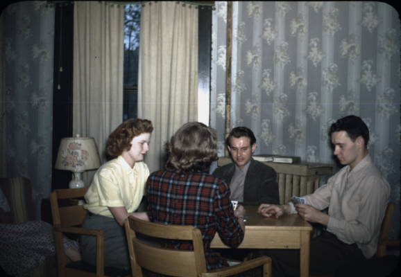 Young Adults Playing Cards on Campus