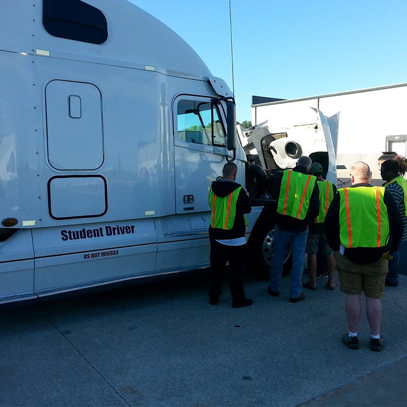 Vincennes University Tractor Trailer program students inspecting a trailer