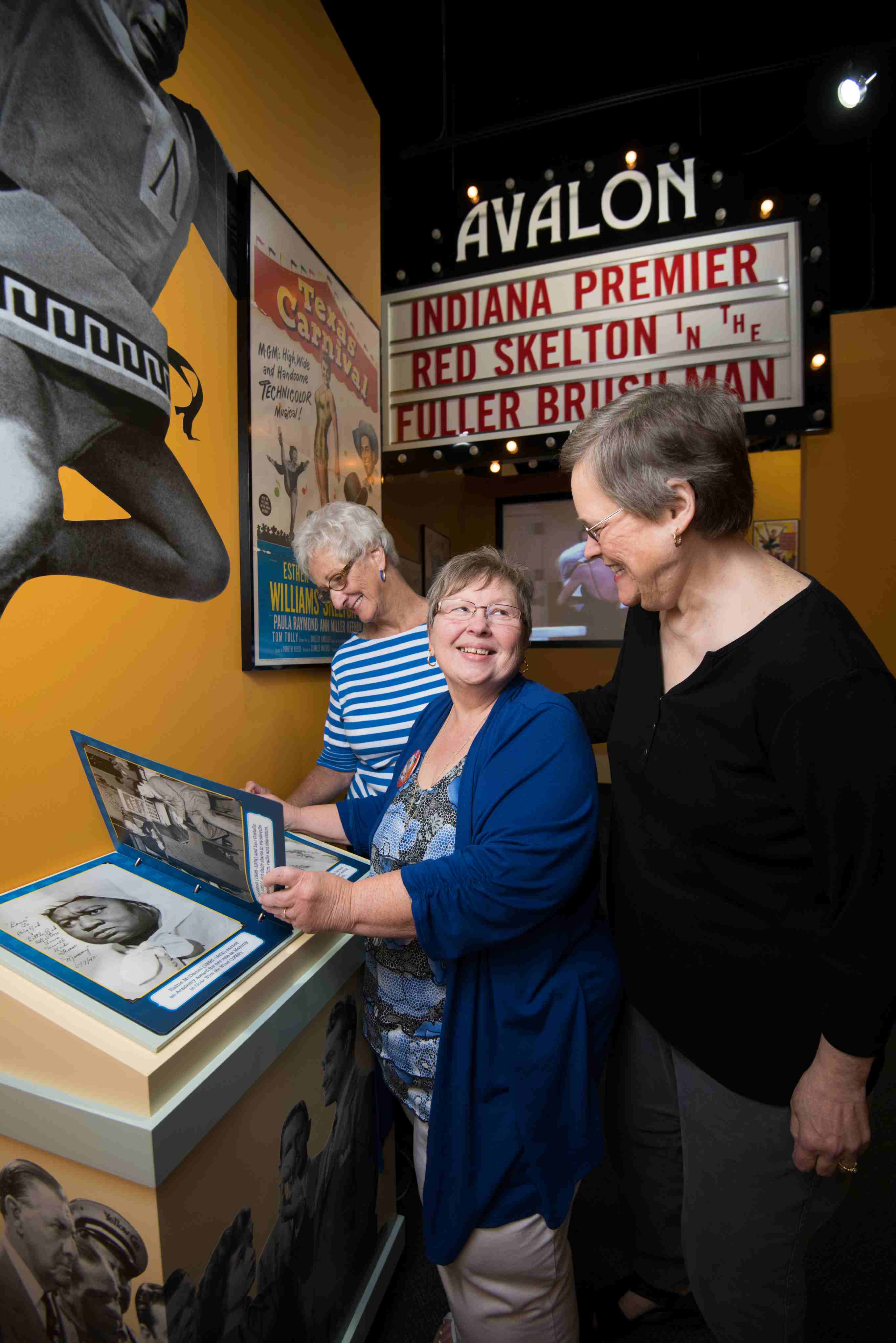 3 older women looking at displays at the Red Skelton Museum
